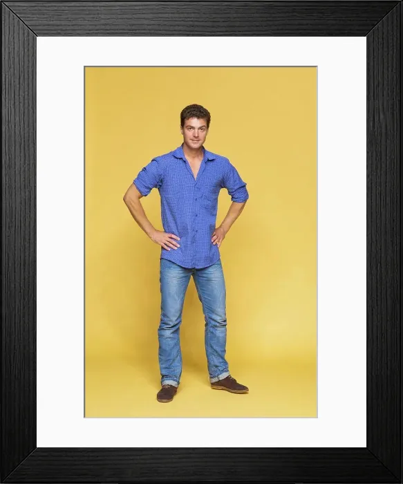 Framed Print : Portrait handsome man in blue on yellow background