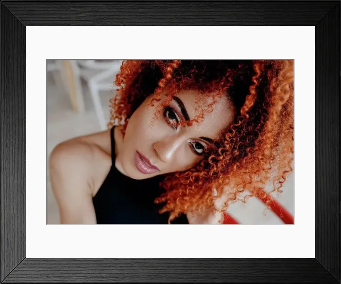 Framed Print : Confident woman Afro brown hair at cafe Framed Print : Confident woman Afro brown hair at cafe