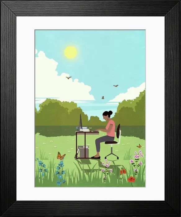 Framed Print : Businesswoman working at desk in sunny, idyllic springtime meadow Framed Print : Businesswoman working at desk in sunny, idyllic springtime meadow