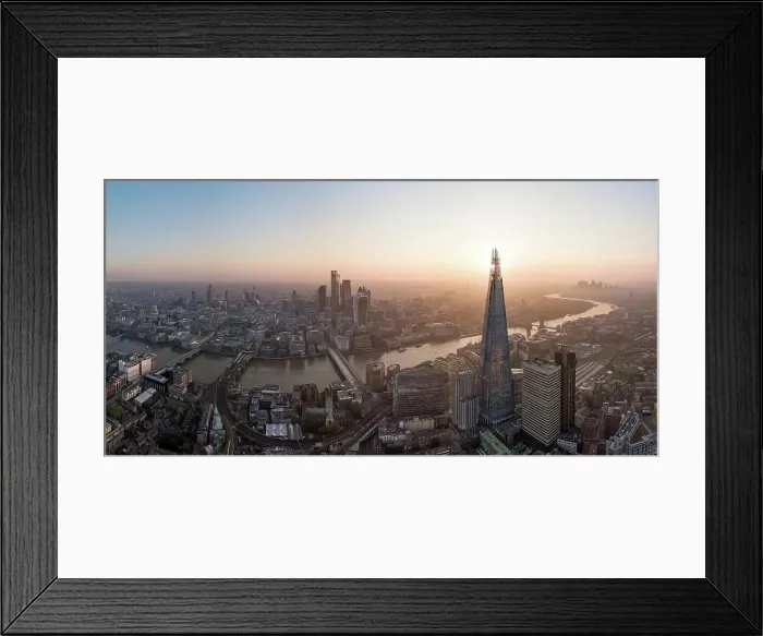 Framed Print : Aerial View of The Shard landmark tower and City of London, and the River Thames at dawn Framed Print : Aerial View of The Shard landmark tower and City of London, and the River Thames at dawn