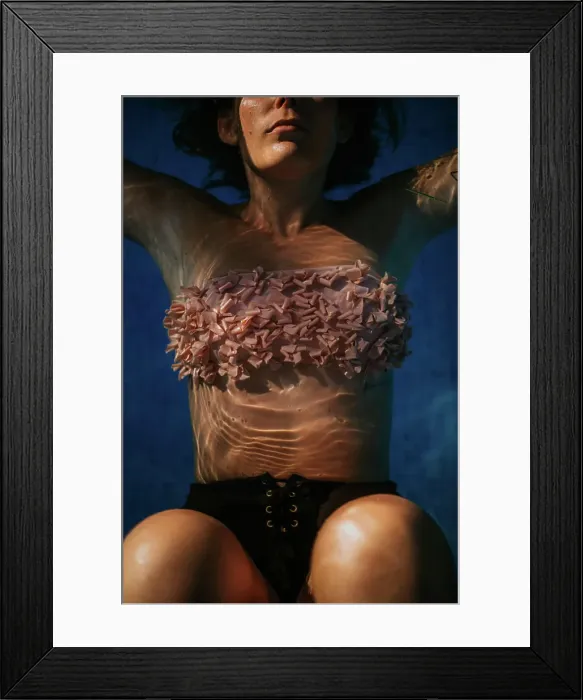 Framed Print : Cropped unrecognizable woman above water surface resting tranquil in swimming pool on sunny summer day Framed Print : Cropped unrecognizable woman above water surface resting tranquil in swimming pool on sunny summer day