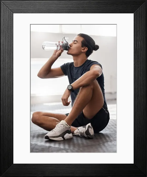 Framed Print : Water bottle, fitness and gym man tired after a fitness training Framed Print : Water bottle, fitness and gym man tired after a fitness training