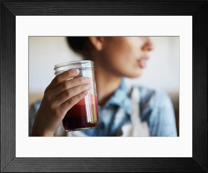 Framed Print : Glass, hand and smoothie with woman in kitchen of home closeup for diet Framed Print : Glass, hand and smoothie with woman in kitchen of home closeup for diet