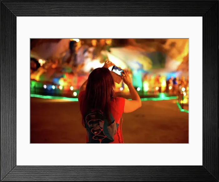 Framed Print : Tourist taking photograph of light decorations, Batu Caves, Kuala Lumpur, Malaysia