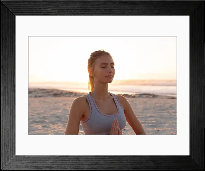 Framed Print : Caucasian woman meditating and practicing yoga at the beach. fitness yoga and healthy lifestyle concept Framed Print : Caucasian woman meditating and practicing yoga at the beach. fitness yoga and healthy lifestyle concept