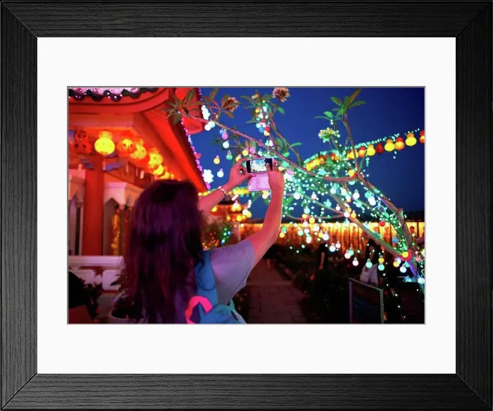 Framed Print : Tourist taking photograph of light decorations, Kek Lok Si Temple, Penang Island, Malaysia Framed Print : Tourist taking photograph of light decorations, Kek Lok Si Temple, Penang Island, Malaysia