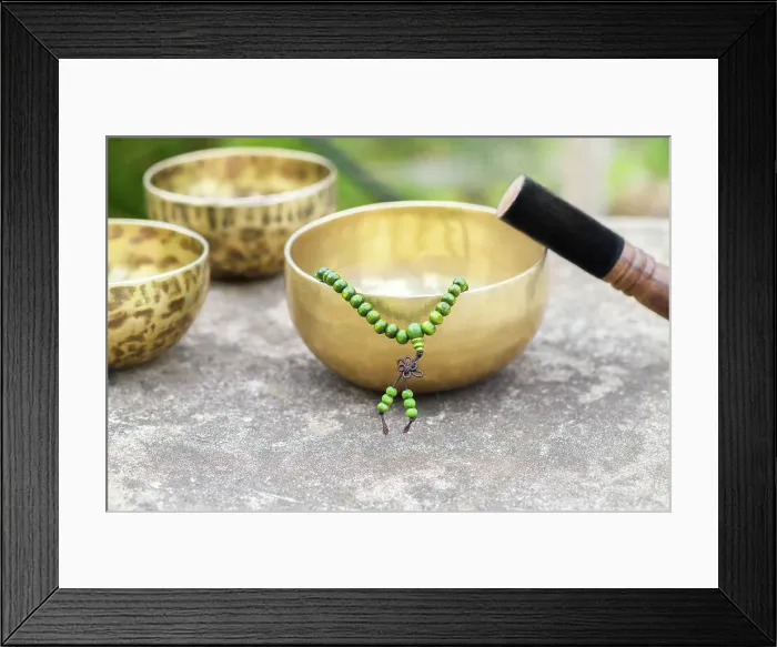 Framed Print : Tibetan singing bowls with sticks on the grey background outdoors Framed Print : Tibetan singing bowls with sticks on the grey background outdoors