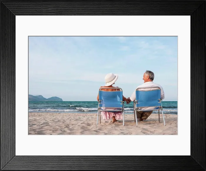 Framed Print : Couple on deckchairs on beach, Palma de Mallorca, Spain Framed Print : Couple on deckchairs on beach, Palma de Mallorca, Spain