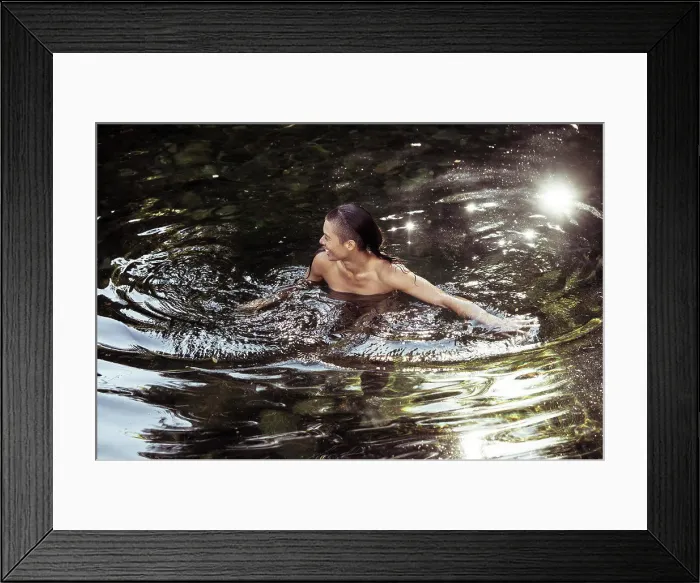 Framed Print : Androgynous young person wading in luscious water Framed Print : Androgynous young person wading in luscious water