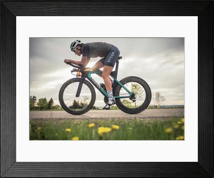 Framed Print : Professional triathlete on her road bike, time trial bike round, Auerberg, Allgäu, Bavaria, Germany