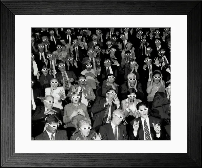 Framed Print : Group of people in a theater wearing 3-D glasses Framed Print : Group of people in a theater wearing 3-D glasses