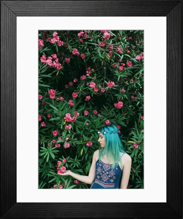 Framed Print : Serene young woman with blue hair standing below flowering tree Framed Print : Serene young woman with blue hair standing below flowering tree