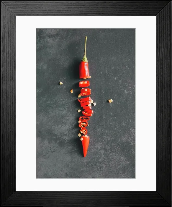 Framed Print : Directly above shot of chopped red chili pepper on table