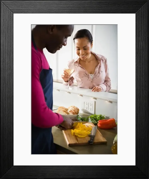 Framed Print : A couple preparing food