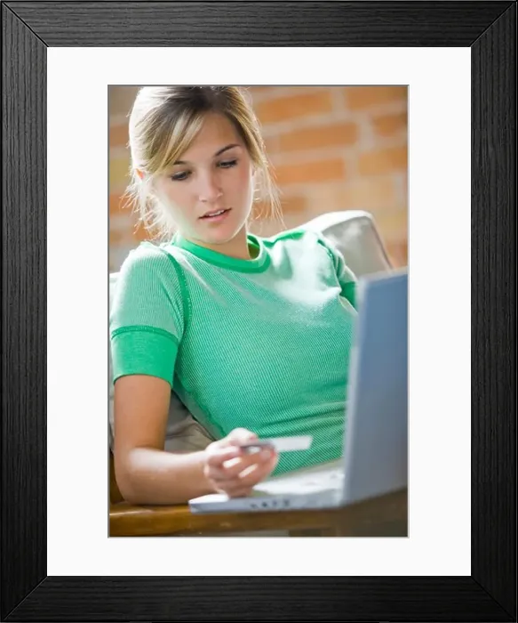 Framed Print : Woman at laptop