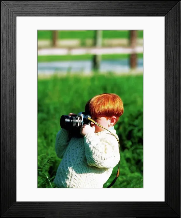 Framed Print : Ireland, Boy taking a picture Framed Print : Ireland, Boy taking a picture