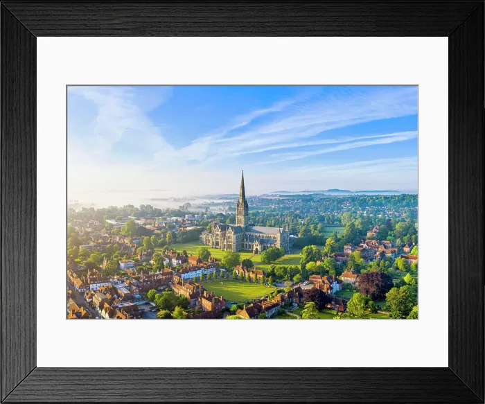 Framed Print : Aerial view over Salisbury and Salisbury Cathedral on a misty summer morning Framed Print : Aerial view over Salisbury and Salisbury Cathedral on a misty summer morning