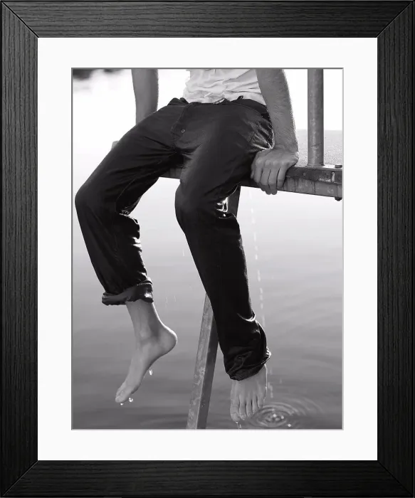 Framed Print : Boy Seated on Dock with Wet Clothes Framed Print : Boy Seated on Dock with Wet Clothes