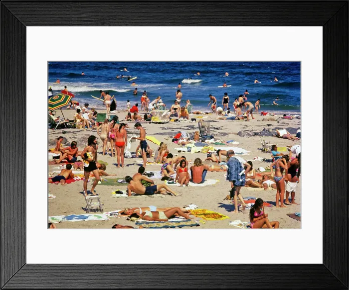 Framed Print : 1970s CROWDED BUSY SUMMERTIME BEACH ON JERSEY ATLANTIC OCEAN SHORE BODY SURFERS SUNBATHERS FAMILY GROUPS TEENAGERS NJ
