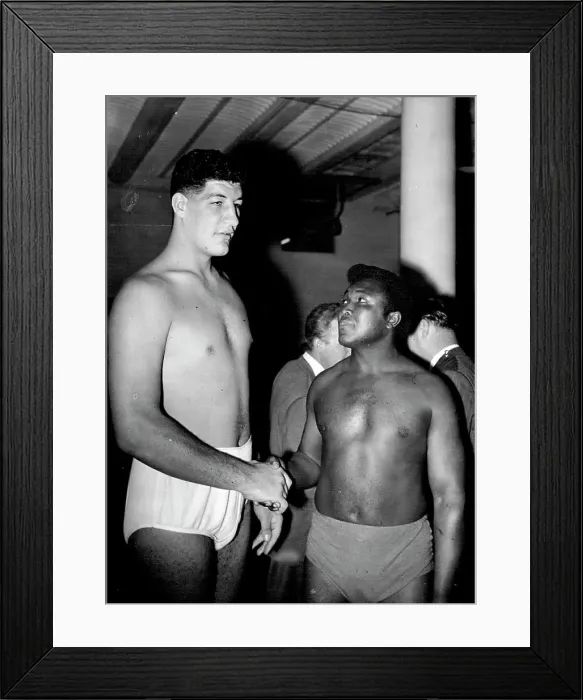 Framed Print : Templar Measures Up Potty Jamaican boxer Simon Templar feels he's long way to go to reach the jaw of his giant South Framed Print : Templar Measures Up Potty Jamaican boxer Simon Templar feels he's long way to go to reach the jaw of his giant South