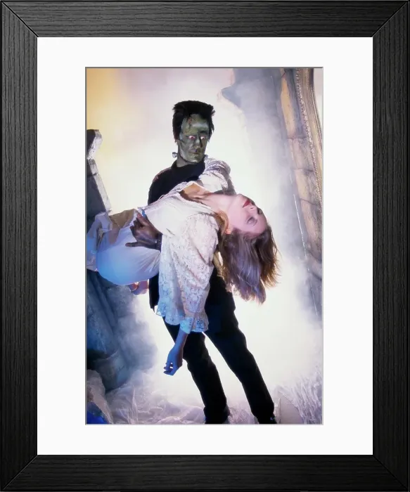 Framed Print : Frankenstein carrying a young woman Framed Print : Frankenstein carrying a young woman
