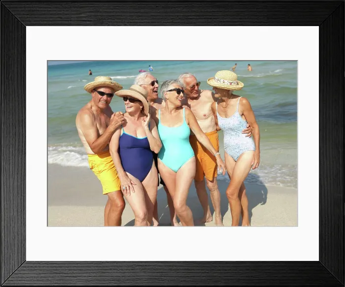 Framed Print : Senior friends smiling on beach Framed Print : Senior friends smiling on beach