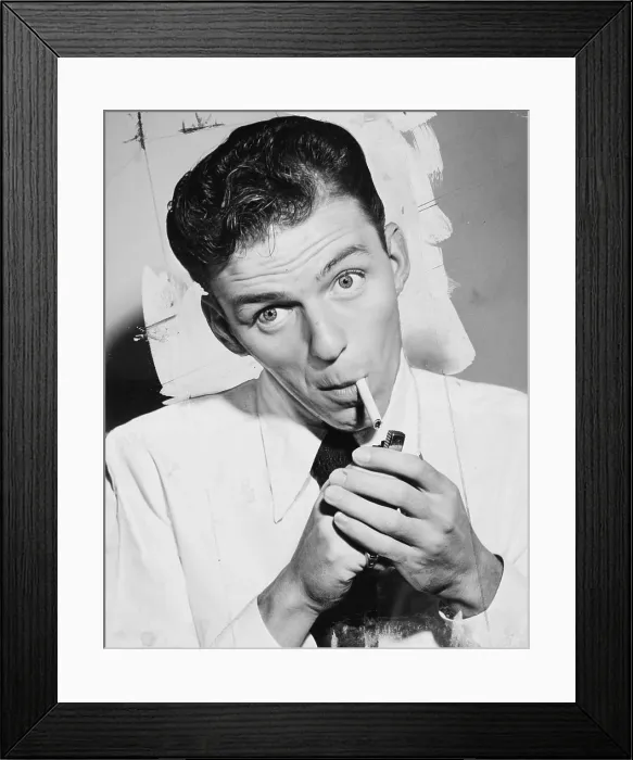 Framed Print : Frank Sinatra lighting a cigarette Framed Print : Frank Sinatra lighting a cigarette