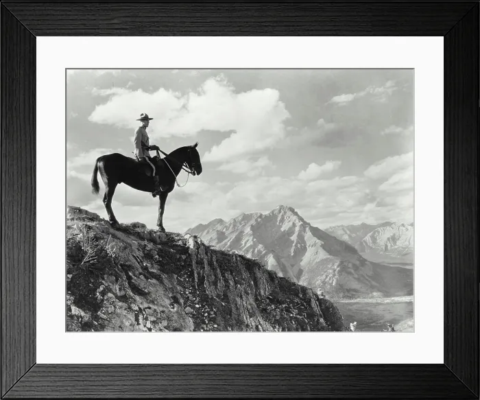 Framed Print : Vintage photograph. A Royal Canadian Mounted Police constable atop Sulphur Mountain in Banff National Park Framed Print : Vintage photograph. A Royal Canadian Mounted Police constable atop Sulphur Mountain in Banff National Park