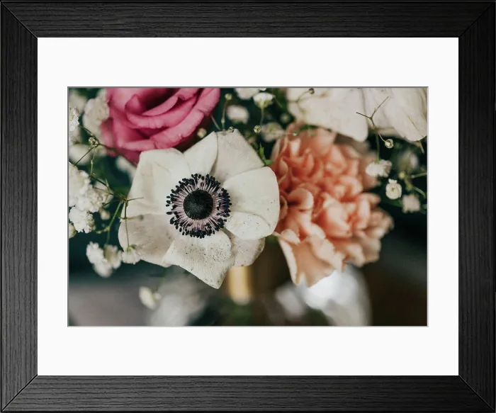 Framed Print : Close up spring flower arrangement against teal cloth backdrop Framed Print : Close up spring flower arrangement against teal cloth backdrop