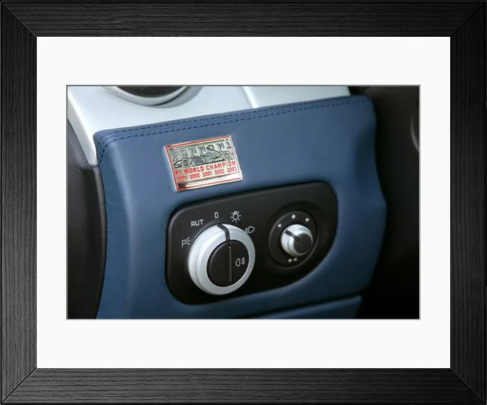 Framed Print : interior Ferrari 612 Scaglietti 2005 light switch knob plaque