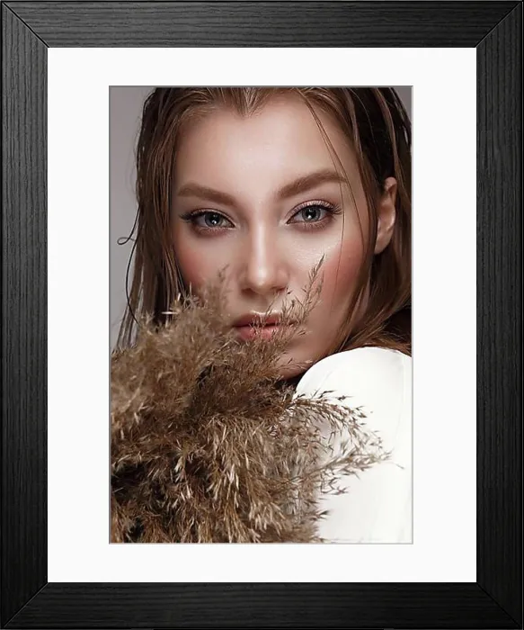 Framed Print : Beautiful woman with classic nude make-up, light hairstyle and dry flowers. Beauty face. Photo taken in studio