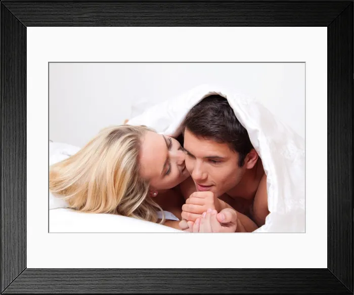 Framed Print : couple has fun in bed. laughter, joy and eroticism in the bedroom Framed Print : couple has fun in bed. laughter, joy and eroticism in the bedroom