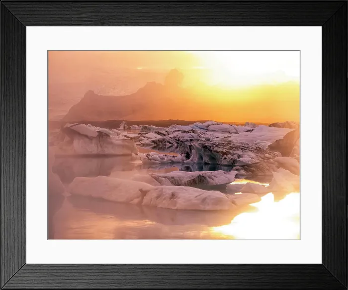 Framed Print : Icebergs floating in Jokulsarlon glacier lagoon lake at sunset