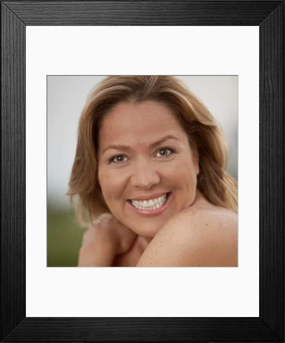 Framed Print : Portrait of a mature woman smiling