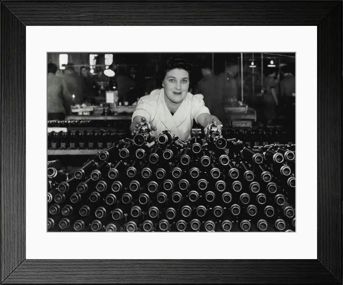 Framed Print : Making The 'Besa' Gun -- A woman inspector with a batch of 'Besa' gun barrels Framed Print : Making The 'Besa' Gun -- A woman inspector with a batch of 'Besa' gun barrels