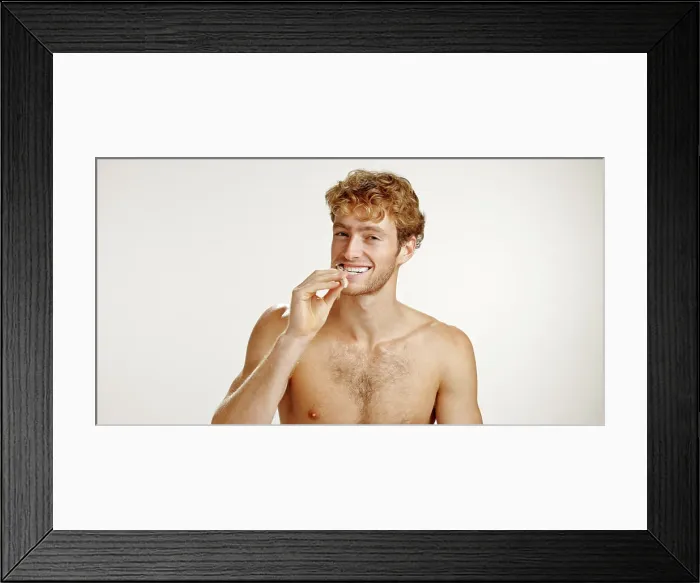 Framed Print : Dental care, happy and man brushing teeth in studio for fresh breath Framed Print : Dental care, happy and man brushing teeth in studio for fresh breath