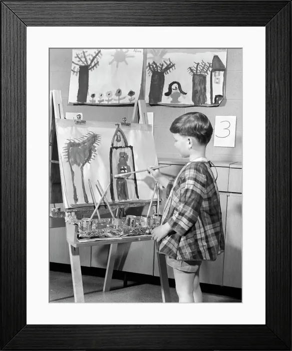 Framed Print : 1960S Boy In Smock Painting At Easel In Art Class Framed Print : 1960S Boy In Smock Painting At Easel In Art Class