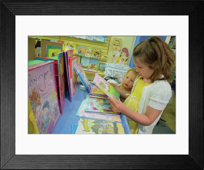 Framed Print : USA, Washington State, Kirkland. Kids shopping in a bookstore. (MR, PR) Framed Print : USA, Washington State, Kirkland. Kids shopping in a bookstore. (MR, PR)