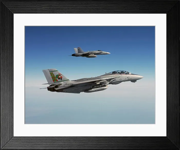Framed Print : Santa Claus inspired tail design on an F-14, with an F / A-18 wingman flying alongside Framed Print : Santa Claus inspired tail design on an F-14, with an F / A-18 wingman flying alongside