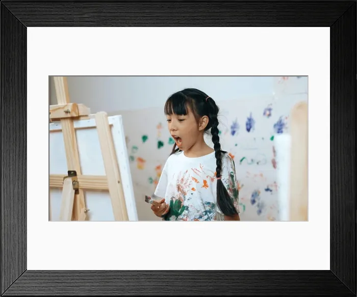 Framed Print : Playful student painted or draw canvas at stained wall in art lesson Framed Print : Playful student painted or draw canvas at stained wall in art lesson