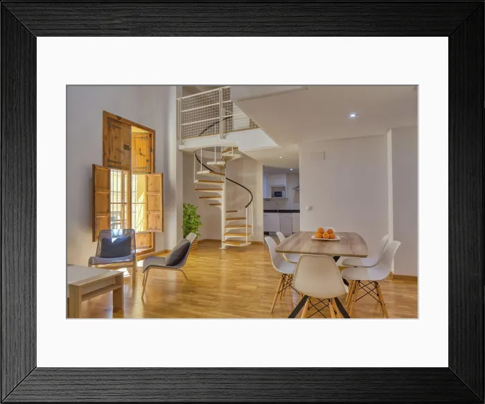 Framed Print : Interior of simple stylish dining room and stairs in modern duplex flat in daylight Framed Print : Interior of simple stylish dining room and stairs in modern duplex flat in daylight