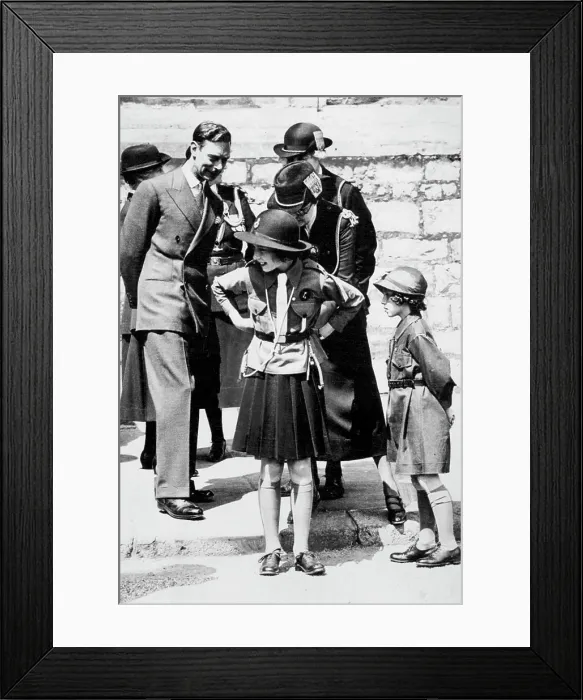 Framed Print : Girl Guides Inspection At Windsor A charming incident during the March Past of the Girl Guides Framed Print : Girl Guides Inspection At Windsor A charming incident during the March Past of the Girl Guides