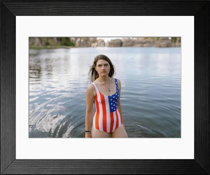 Framed Print : Woman in patriotic swimsuit standing in Sylvan Lake, SD Framed Print : Woman in patriotic swimsuit standing in Sylvan Lake, SD