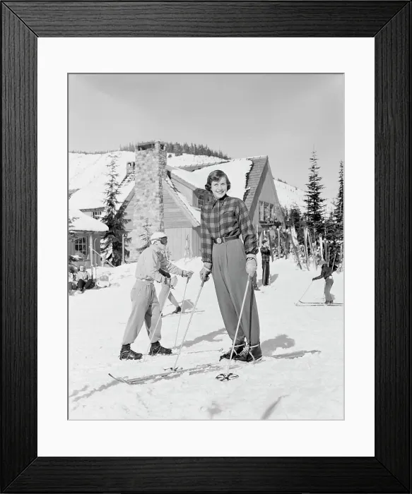Framed Print : Skiers in ski resort