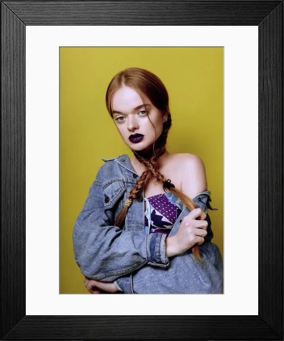 Framed Print : A young beautiful red haired girl posing in jeans jacket with purple lips on yellow background Framed Print : A young beautiful red haired girl posing in jeans jacket with purple lips on yellow background