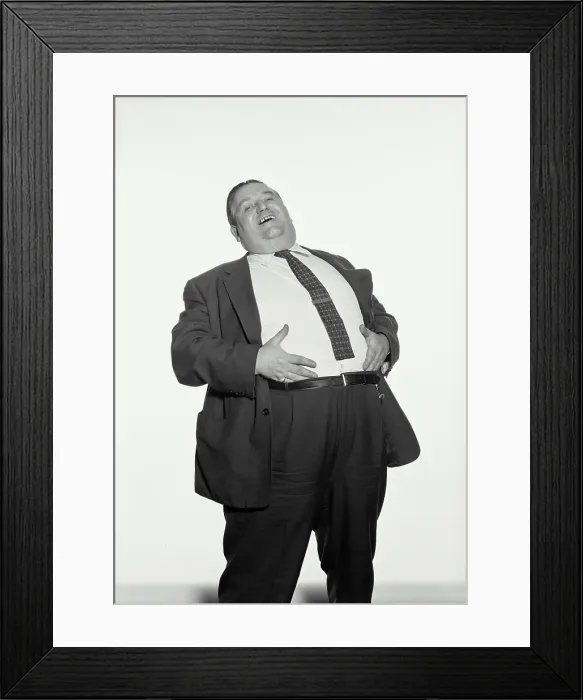 Framed Print : Vintage Photograph. Fat man wearing suit and tie laughing with hands on stomach Framed Print : Vintage Photograph. Fat man wearing suit and tie laughing with hands on stomach