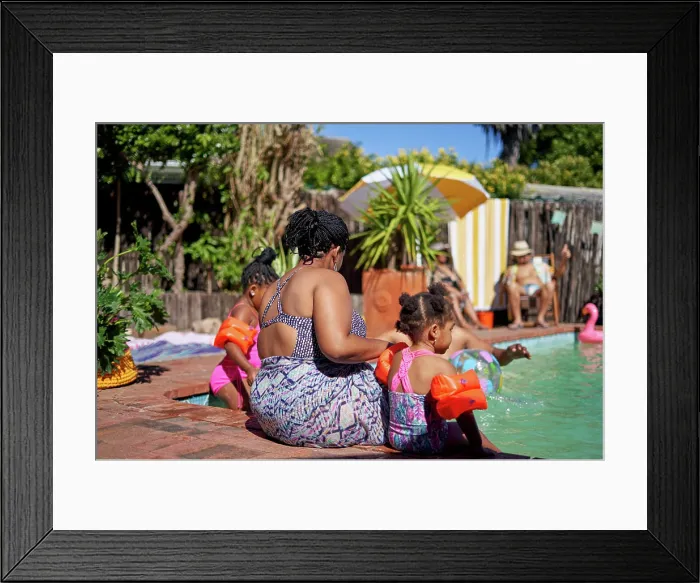 Framed Print : Mother and daughters at sunny summer swimming pool Framed Print : Mother and daughters at sunny summer swimming pool