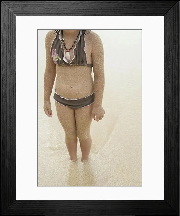 Framed Print : Midsection of a girl in bikini Framed Print : Midsection of a girl in bikini
