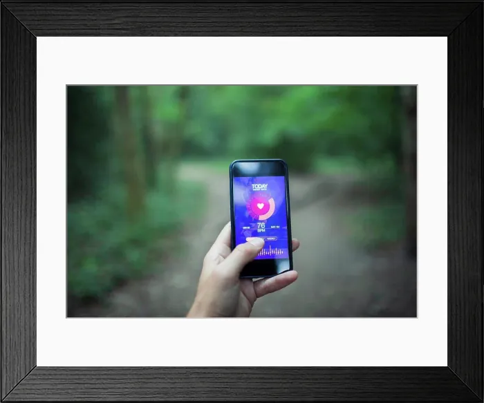 Framed Print : Close up POV runner using health app on smart phone screen Framed Print : Close up POV runner using health app on smart phone screen