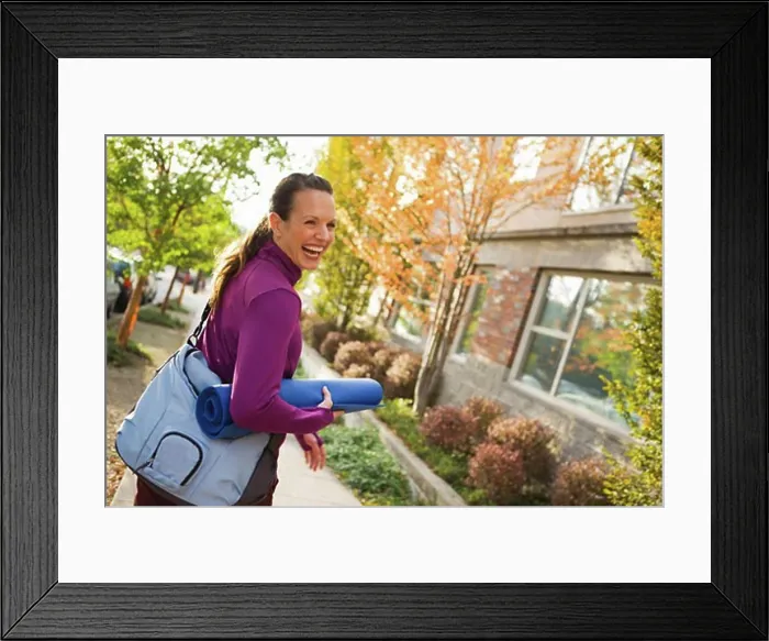 Framed Print : Woman Walking and Carrying Yoga Mat, Seattle, Washington, USA Framed Print : Woman Walking and Carrying Yoga Mat, Seattle, Washington, USA